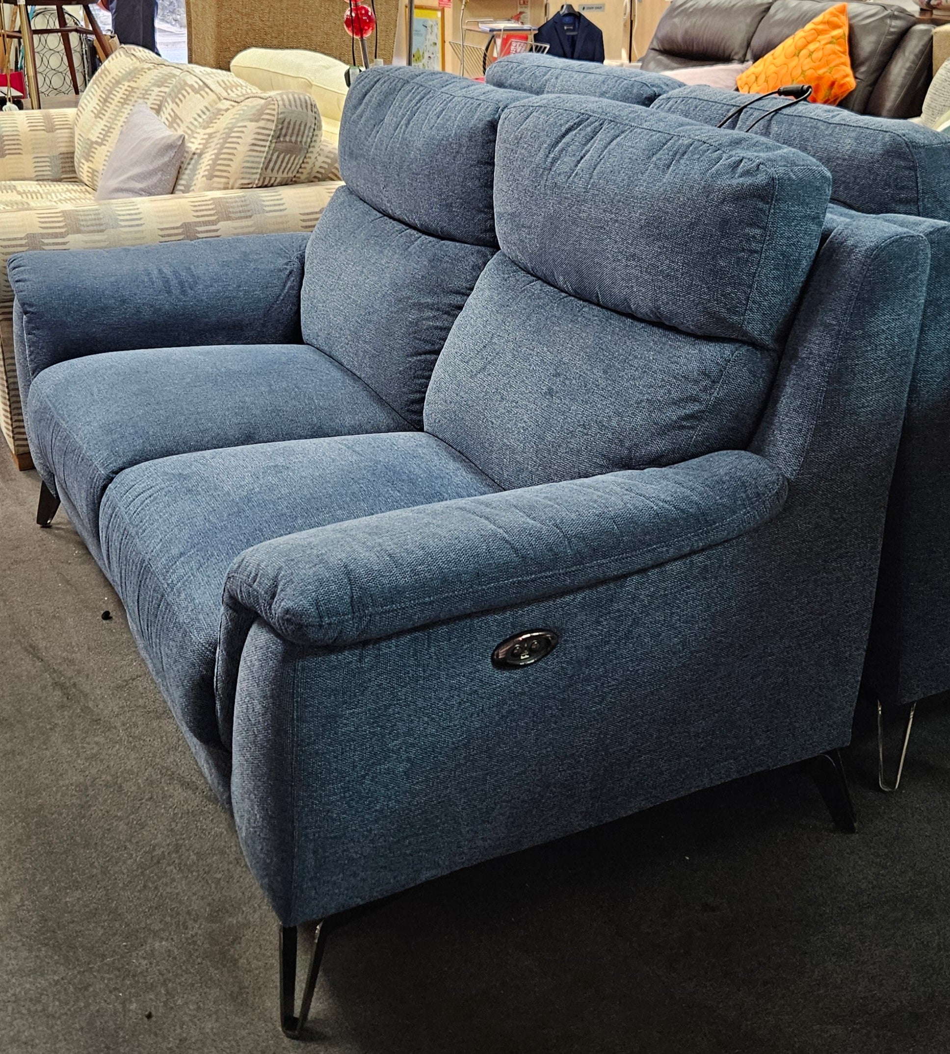 Electric reclining sofa