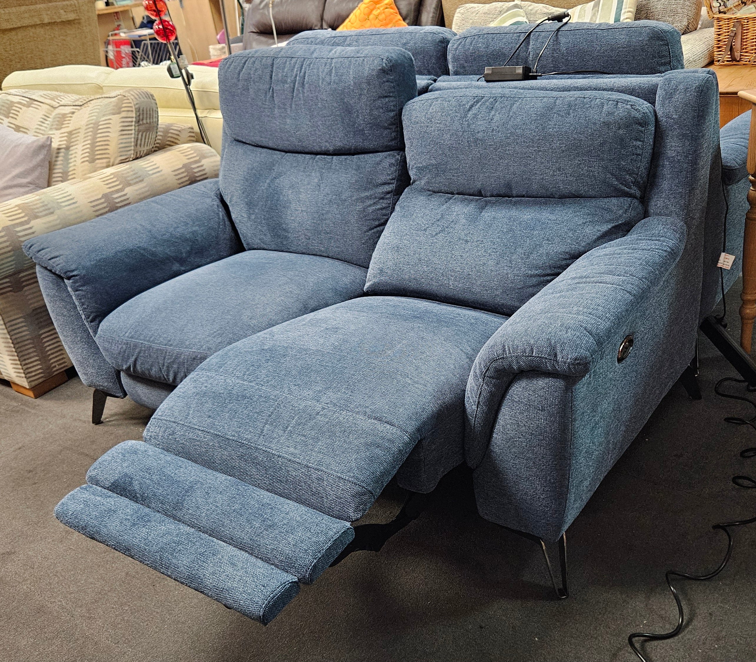 Electric reclining sofa